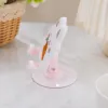 Cute pink rabbit-shaped phone stand, creative multi-functional desktop support, adjustable portable accessory details Picture